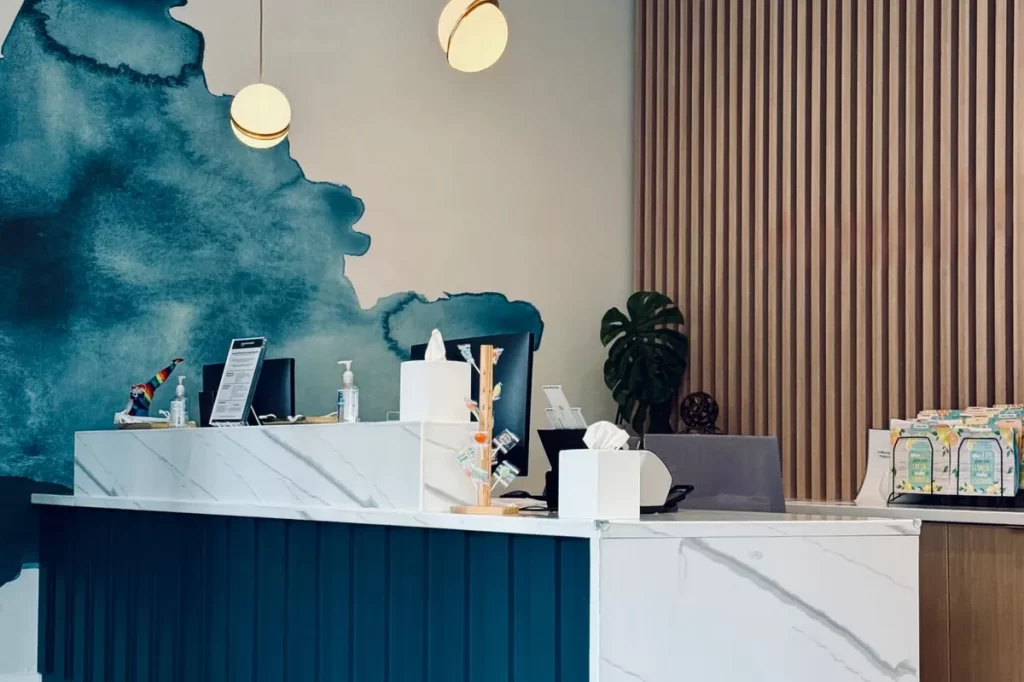 Modern office reception with branded feature wall